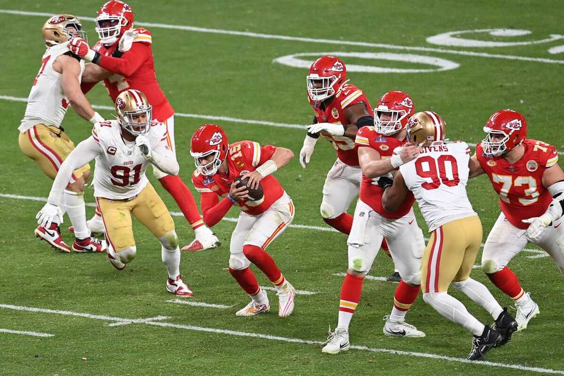 The Kansas City Chiefs players and the San Francisco 49ers at Allegiant Stadium