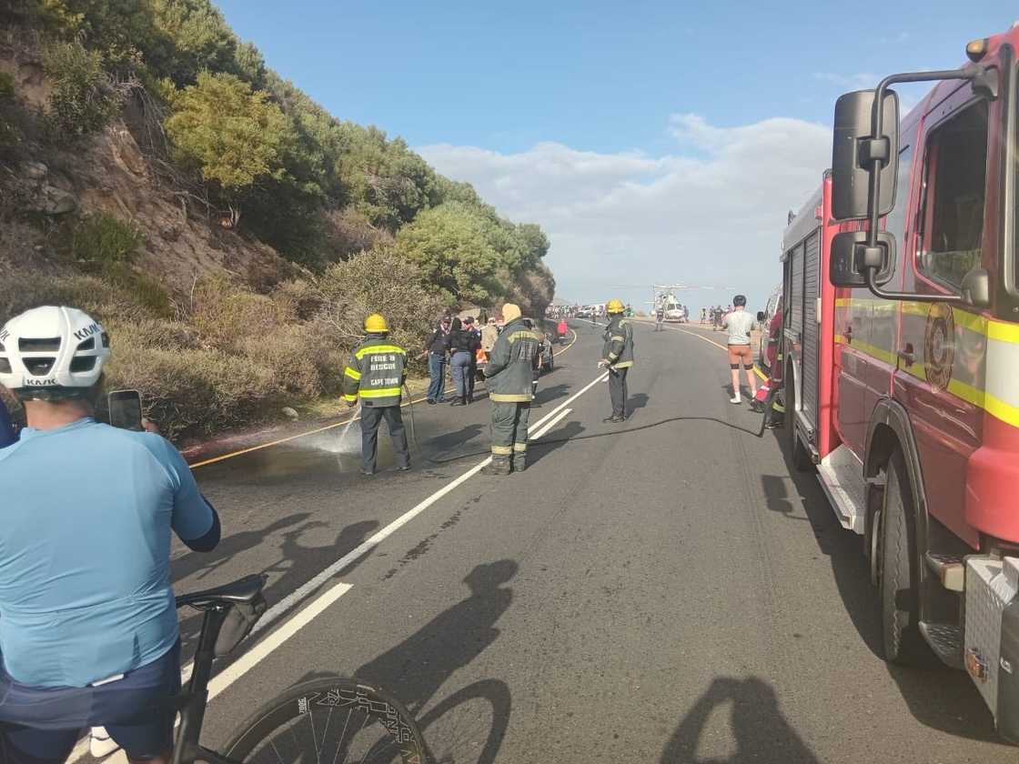 Cyclist, Victoria Road, Twelve Apostles Hotel and Spa, Cape Town.
