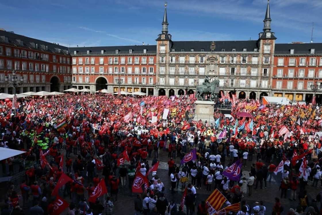 Thousands of people packed Madrid's landmark Plaza Mayor to demand higher pay Thousands of people packed Madrid's landmark Plaza Mayor to demand higher pay