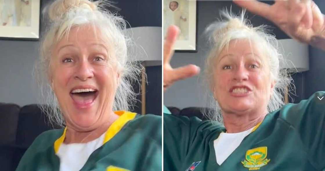 Woman cheers for wrong rugby team.