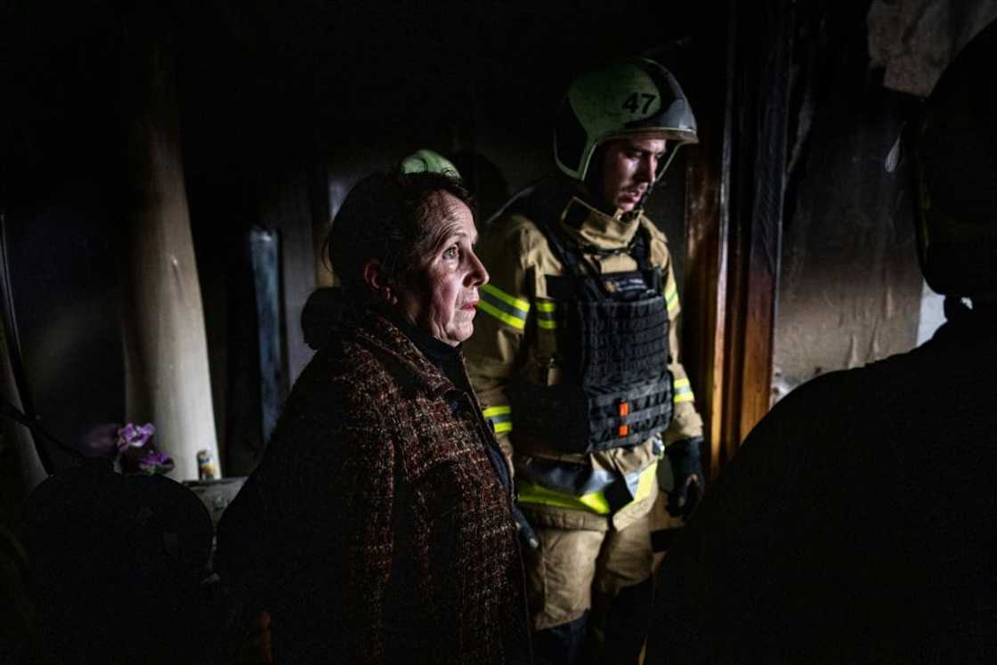 Ukrainian pensioner Lyudmyla Kharchenko returned to her ruined home and a missile head at the foot of her velvet sofa in the living room