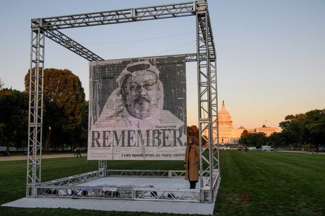 Turkish writer Hatice Cengiz, fiancee of Saudi journalist Jamal Khashoggi, poses next to his portrait in Washington on October 1, 2021, on the third anniversary of his murder at the Saudi consulate in Istanbul Turkish writer Hatice Cengiz, fiancee of Saudi journalist Jamal Khashoggi, poses next to his portrait in Washington on October 1, 2021, on the third anniversary of his murder at the Saudi consulate in Istanbul