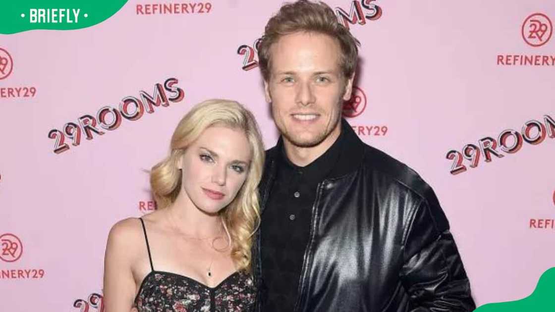 MacKenzie Mauzy and Sam Heughan at an event MacKenzie Mauzy and Sam Heughan at an event