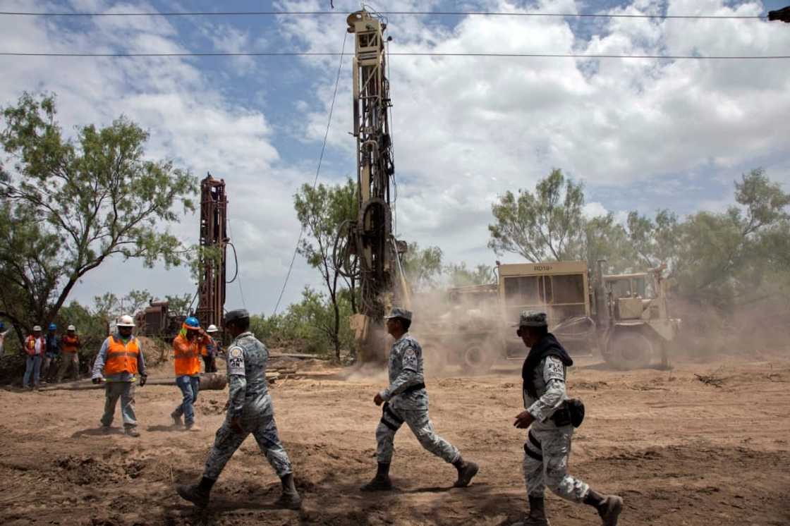 Rescuers work at a coal mine in northern Mexico where 10 people are trapped