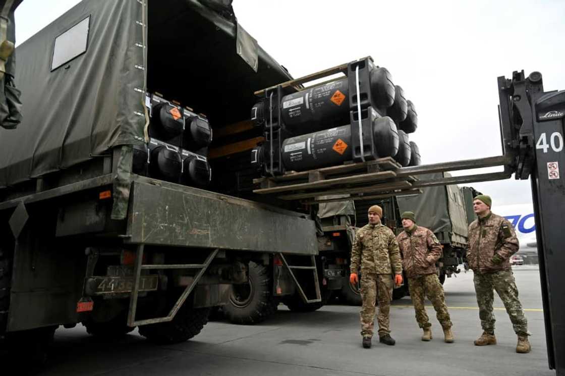 Ukrainian servicemen load a truck with US-supplied Javelin anti-tank missiles on February 11, 2022 Ukrainian servicemen load a truck with US-supplied Javelin anti-tank missiles on February 11, 2022