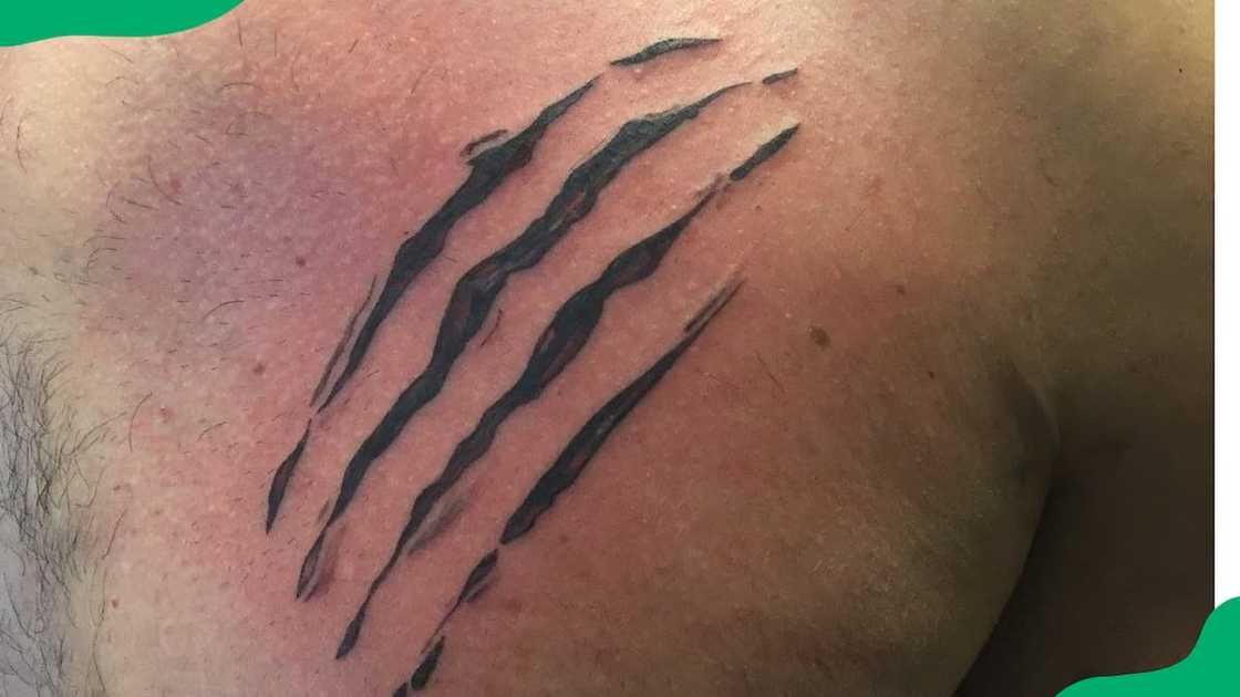 The shoulder scratch tattoo The shoulder scratch tattoo