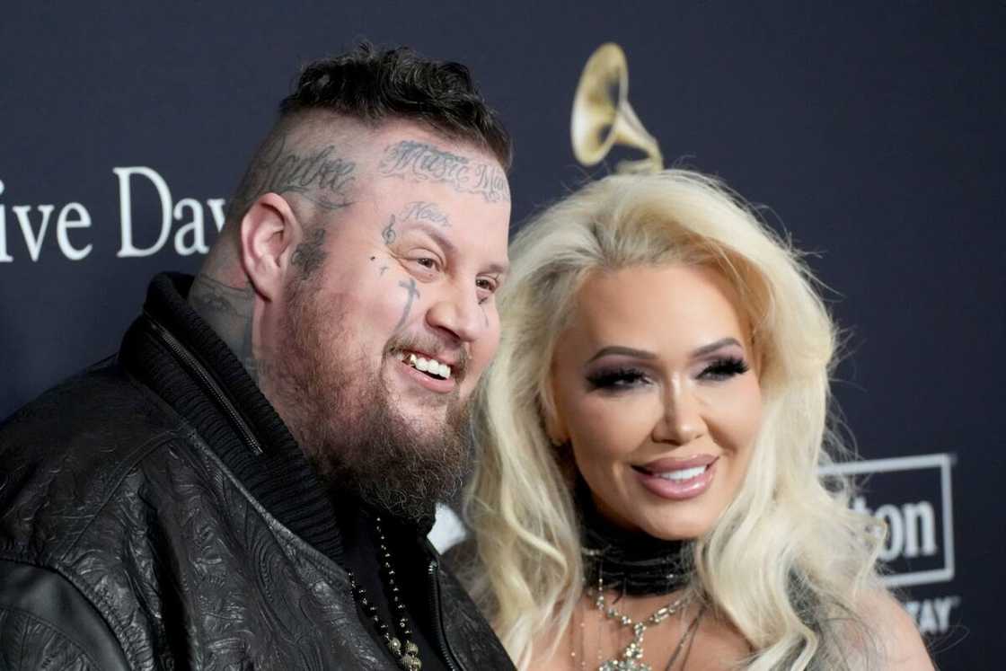 Jelly Roll and his wife at the Pre-Grammy Gala Jelly Roll and his wife at the Pre-Grammy Gala