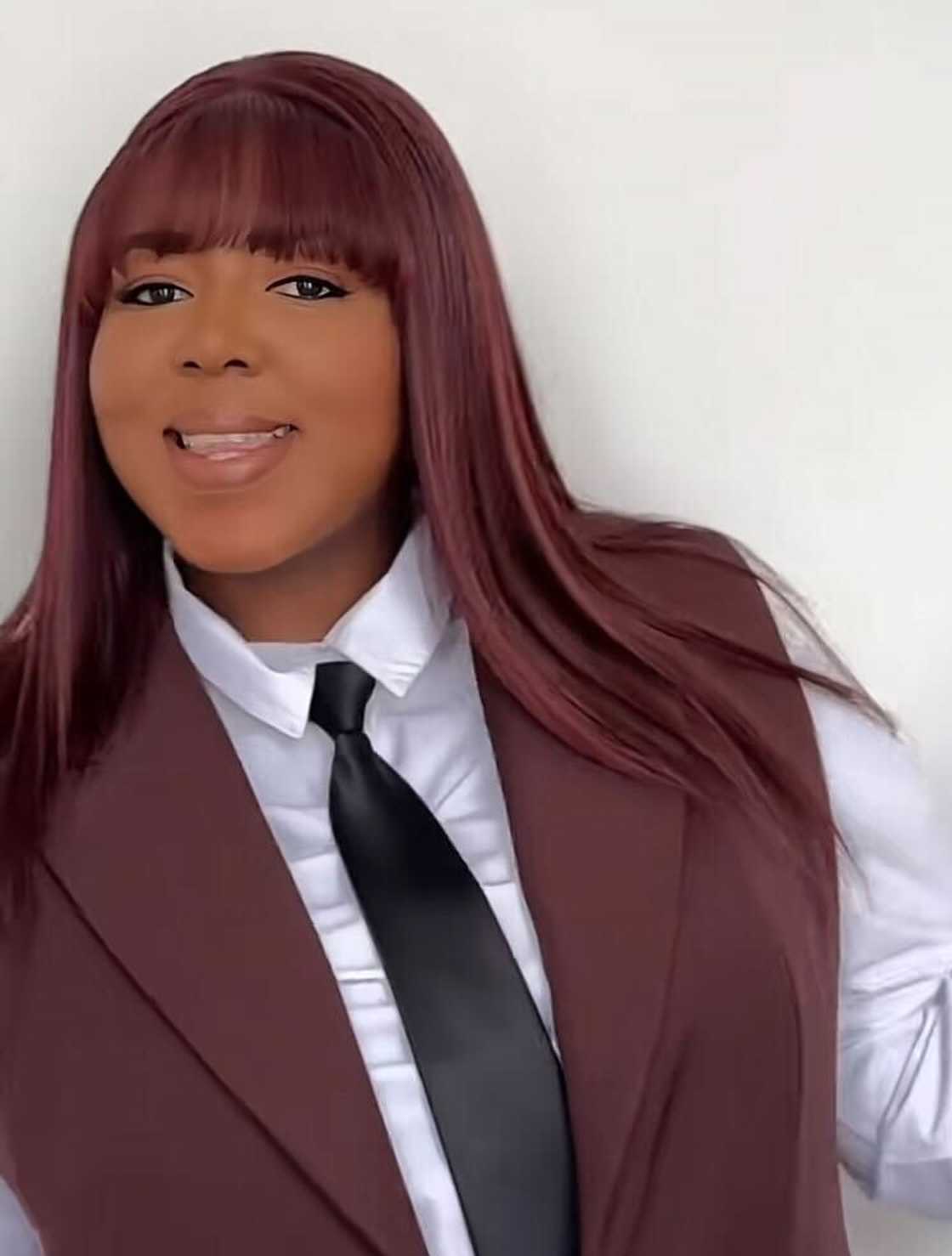 An influencer posed in a TikTok video while showcasing her Shein wig. An influencer posed in a TikTok video while showcasing her Shein wig.
