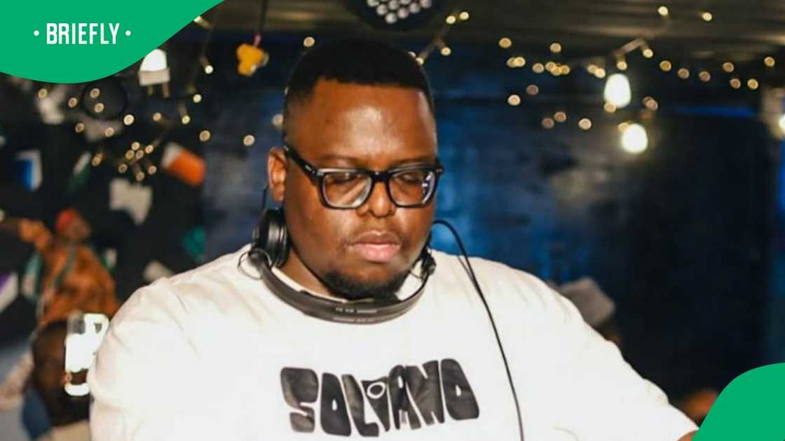 SA reacted to a photo of Sol Phenduka wearing a suit