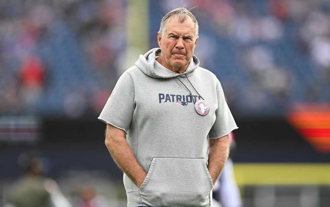 Bill Belichick of the New England Patriots stands on the field prior to the game Bill Belichick of the New England Patriots stands on the field prior to the game