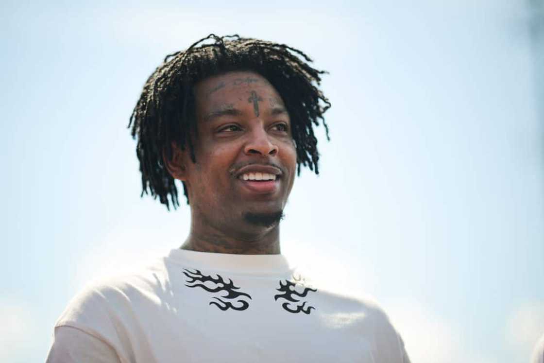 21 Savage during his annual Issa Back to School Drive in August 2022 in Atlanta, Georgia. 21 Savage during his annual Issa Back to School Drive in August 2022 in Atlanta, Georgia.