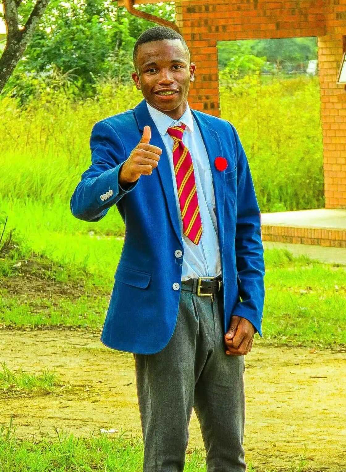 A schoolboy showed off his uniform fit check with price tags. A schoolboy showed off his uniform fit check with price tags.