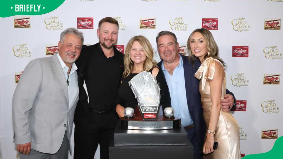 Cal Raleigh with his parents and his girlfriend, Hannah Shimek
