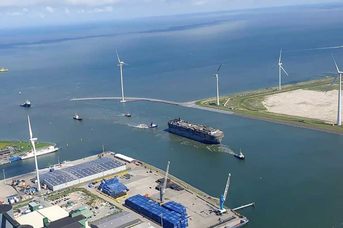 Tugs towed the Fremantle Highway into the Dutch port of Eemshaven