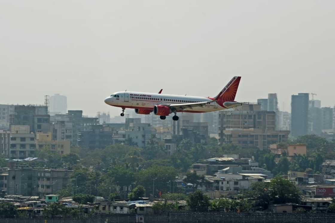 A sacked executive of US banking giant Wells Fargo is accused of urinating on a fellow passenger aboard an Air India flight A sacked executive of US banking giant Wells Fargo is accused of urinating on a fellow passenger aboard an Air India flight