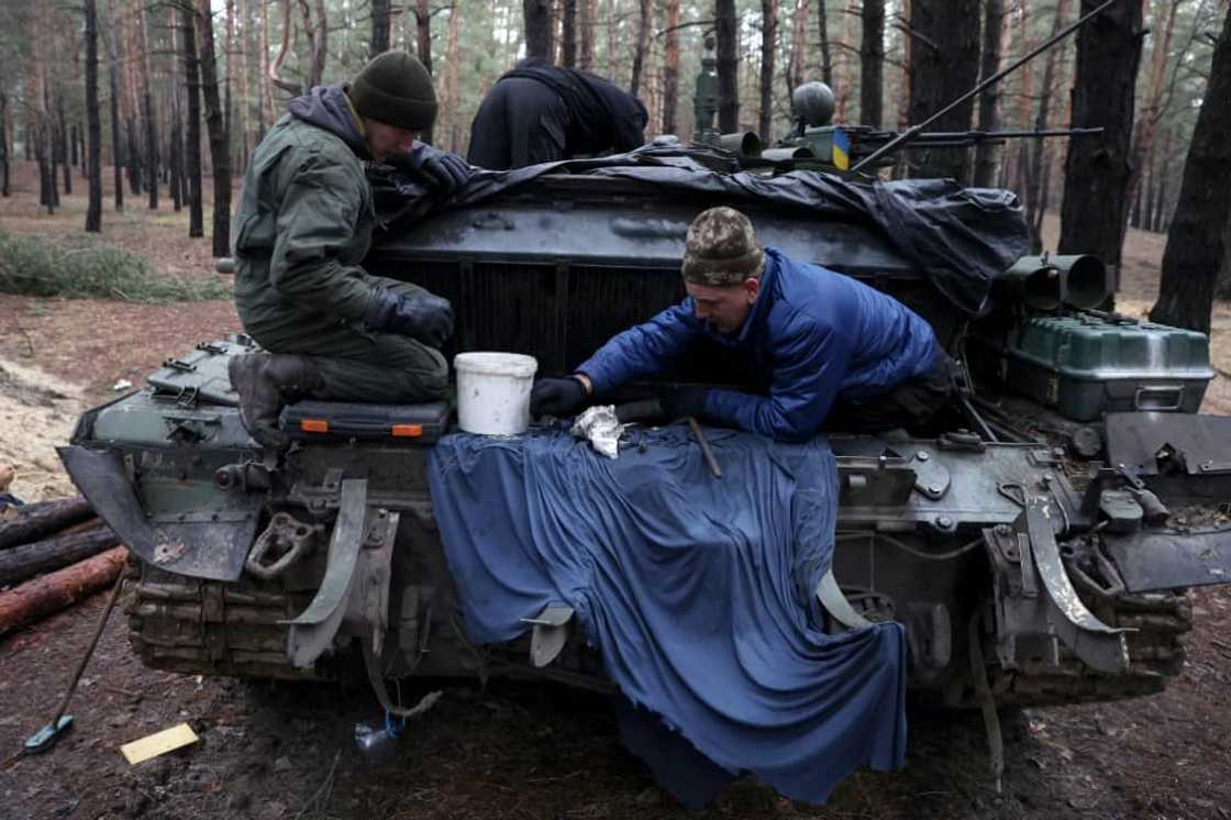 Despite heavy losses over nine months of fighting, the tank platoon members remain confident they will win the war Despite heavy losses over nine months of fighting, the tank platoon members remain confident they will win the war
