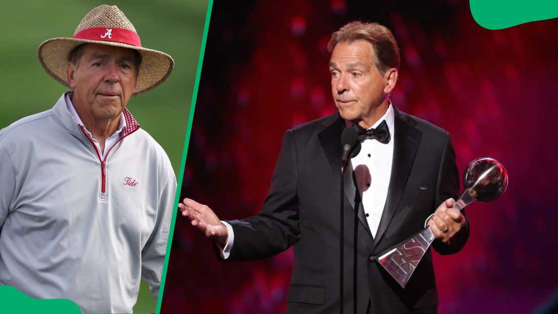 Nick Saban with an award on stage Nick Saban with an award on stage