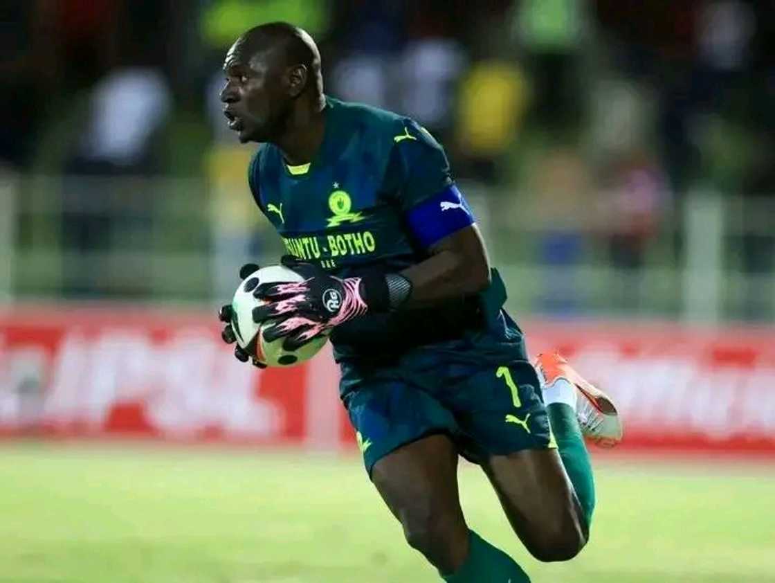 Veteran goalkeeper Denis Onyango in action during a match, moments before receiving a red card, adding to Sundowns' growing disciplinary issues.