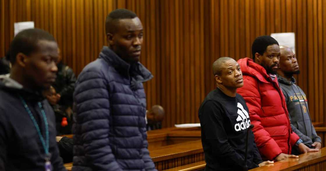 Five accused men in the Senzo Mayiwa murder trial stand in the dock at Pretoria High Court Five accused men in the Senzo Mayiwa murder trial stand in the dock at Pretoria High Court