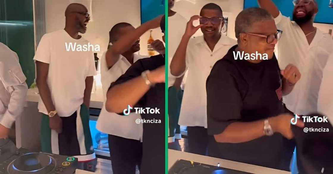 DJ Black Coffee and Fikile Mbalula were captured grooving together