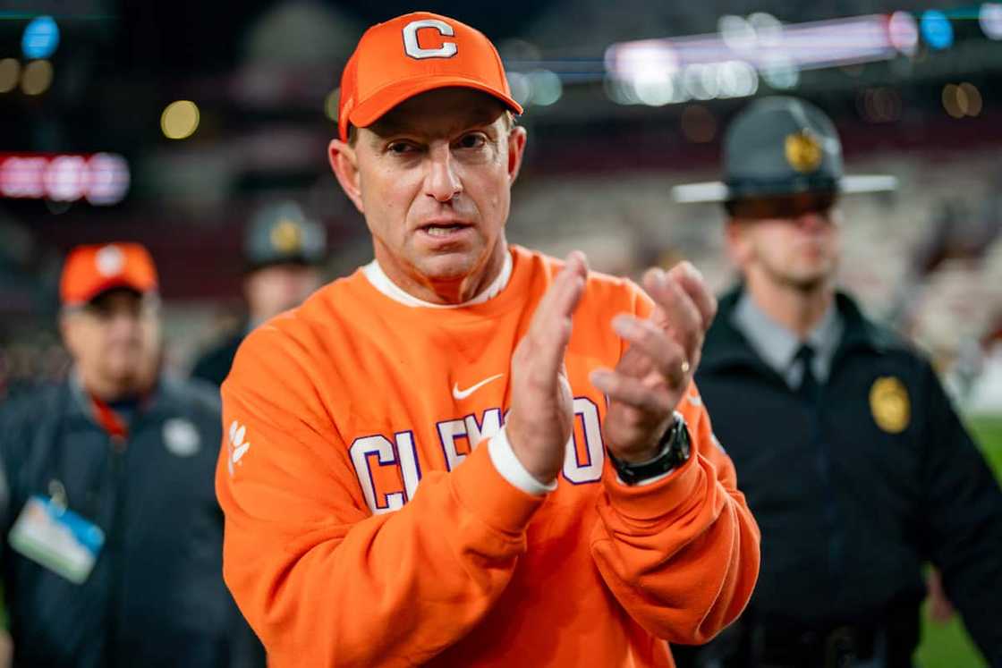 Dabo Swinney of the Clemson Tigers walks off the field after defeating the South Carolina Gamecocks