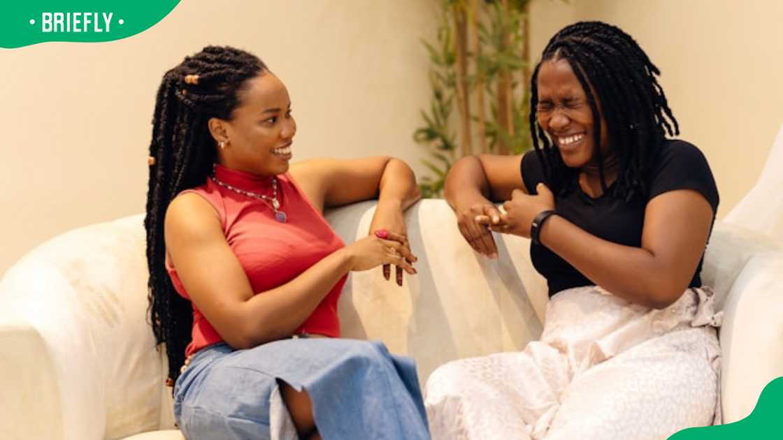 two women in an informal setting two women in an informal setting