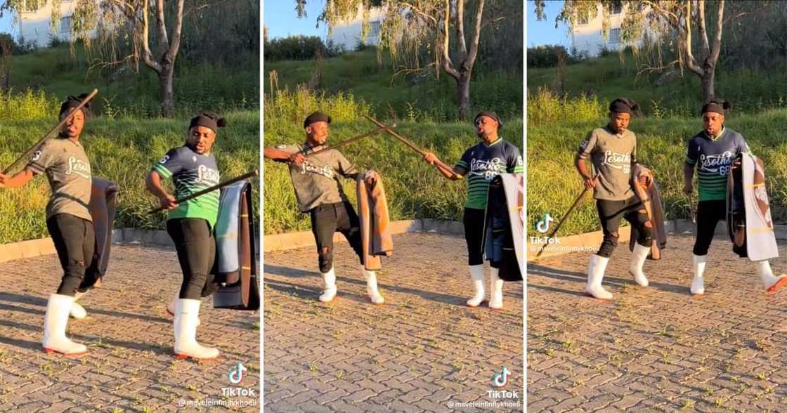 2 Sotho men carrying blankets and sticks slayed a viral dance