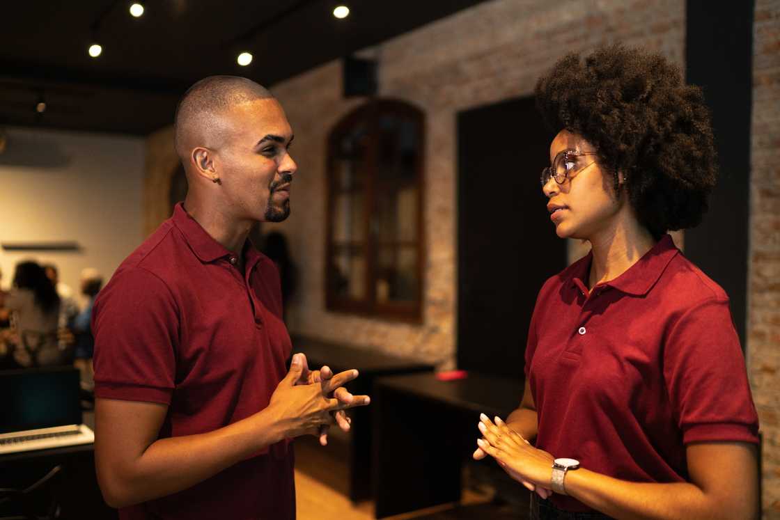 A couple debates plans in public. A couple debates plans in public.