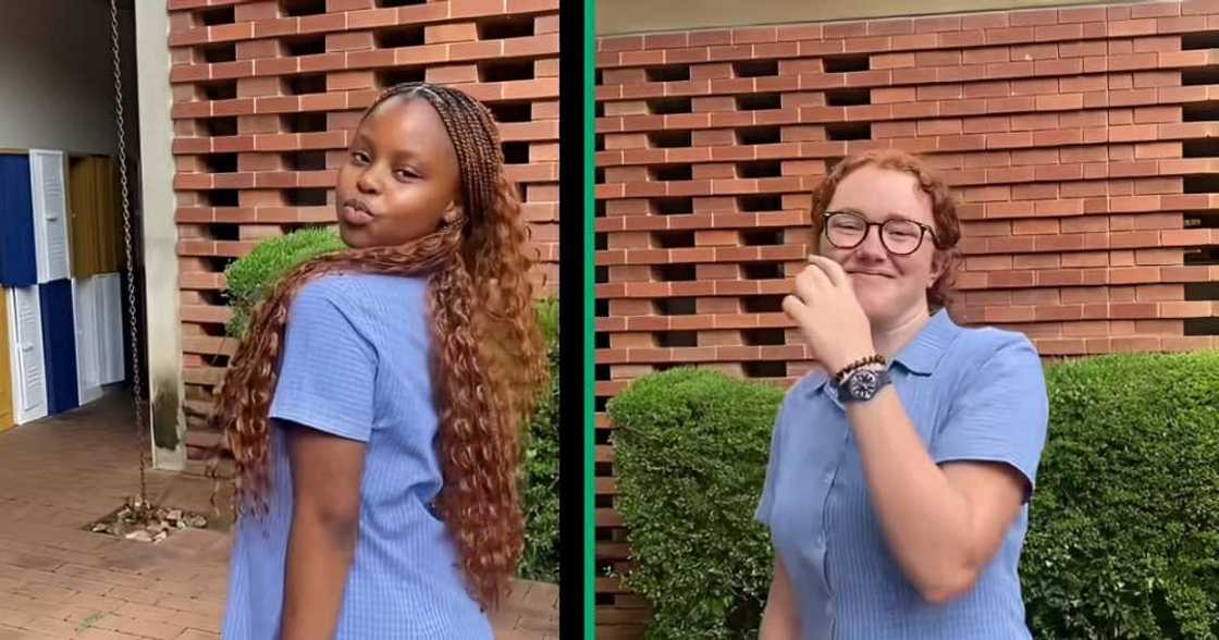 Two school pupils unveiling their matching hairstyles in a TikTok video. Two school pupils unveiling their matching hairstyles in a TikTok video.