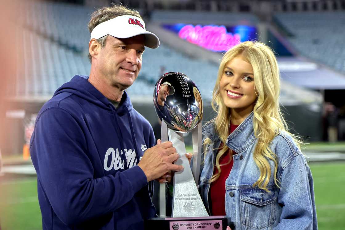 Lane Kiffin and Landry Kiffin at EverBank Stadium