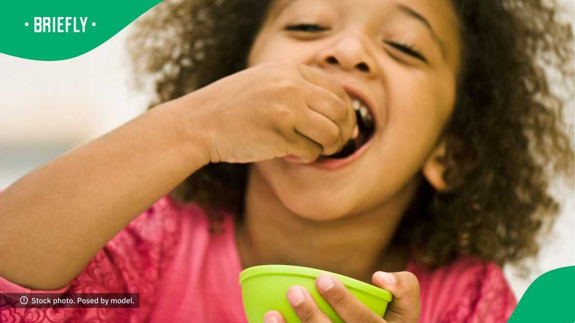 A child eating sweets.