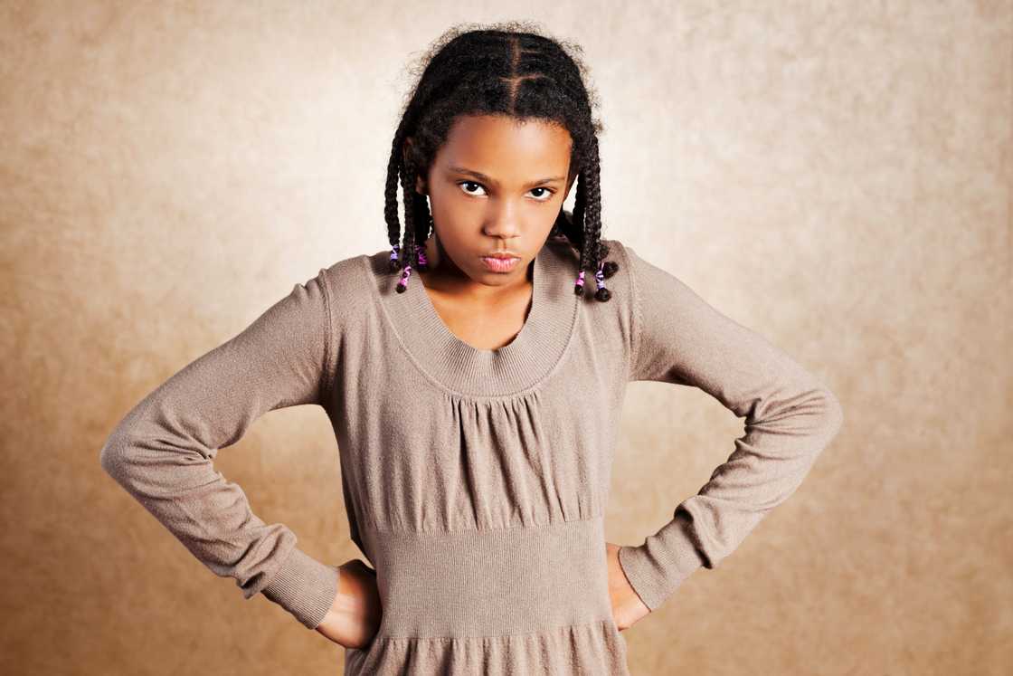 An angry girl standing An angry girl standing