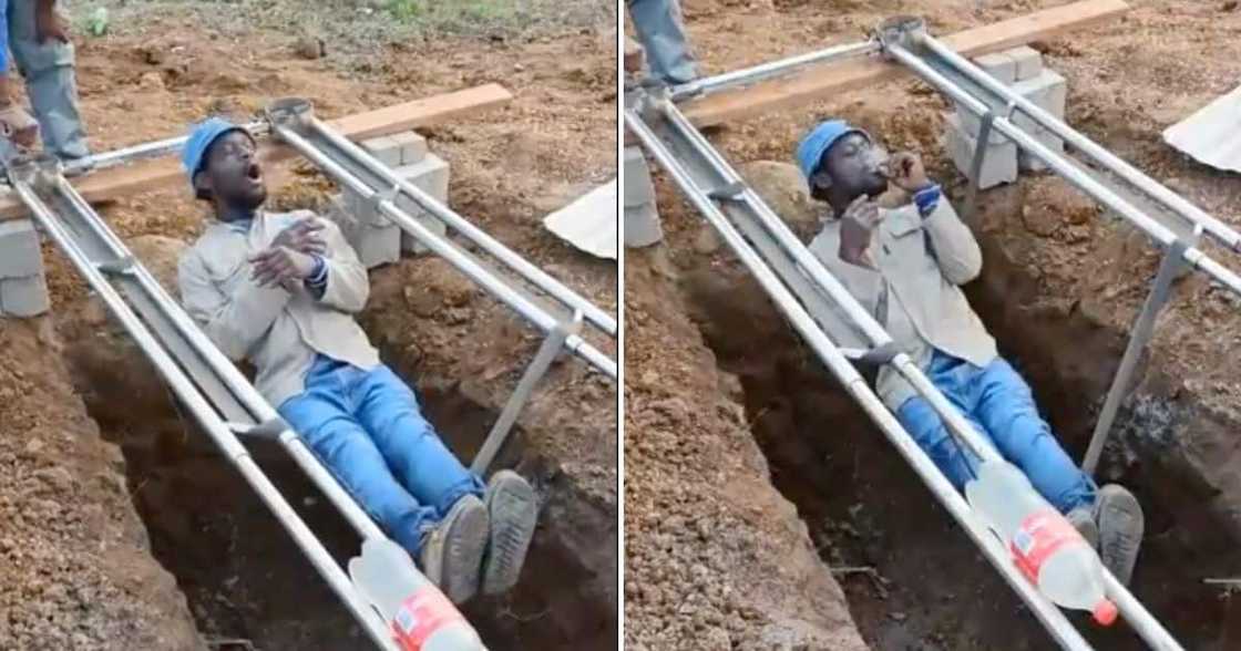 South African man lowered into a grave South African man lowered into a grave