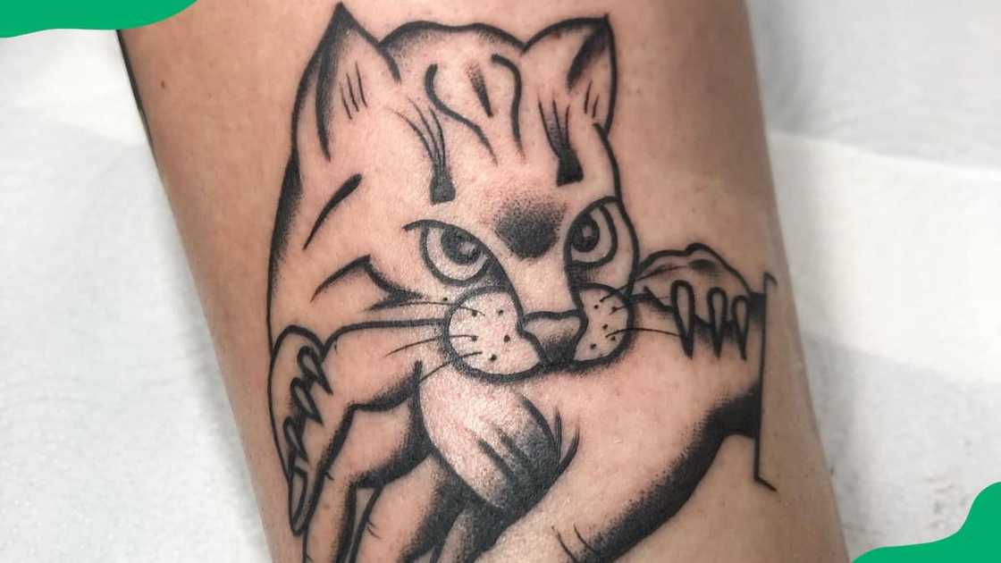Bite cat tattoo Bite cat tattoo