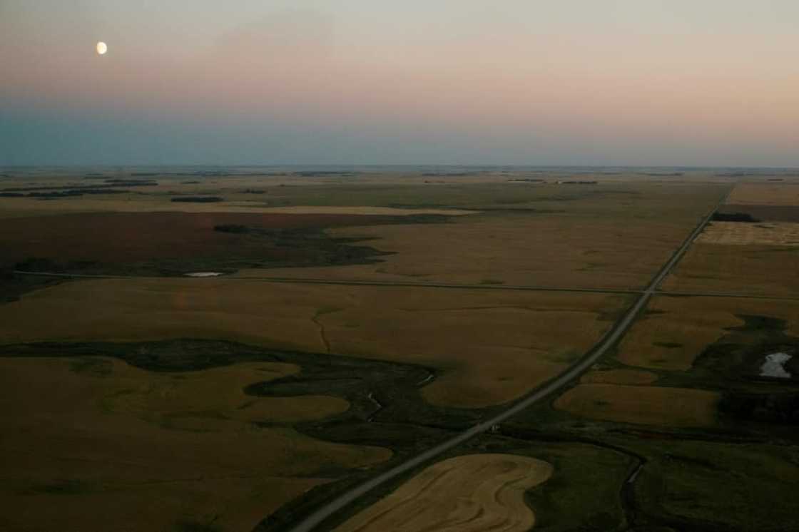 Dusk falls over the Indigenous community of James Smith Cree Nation during a manhunt for Myles Sanderson, a suspect in the mass stabbings that occurred in the Canadian community