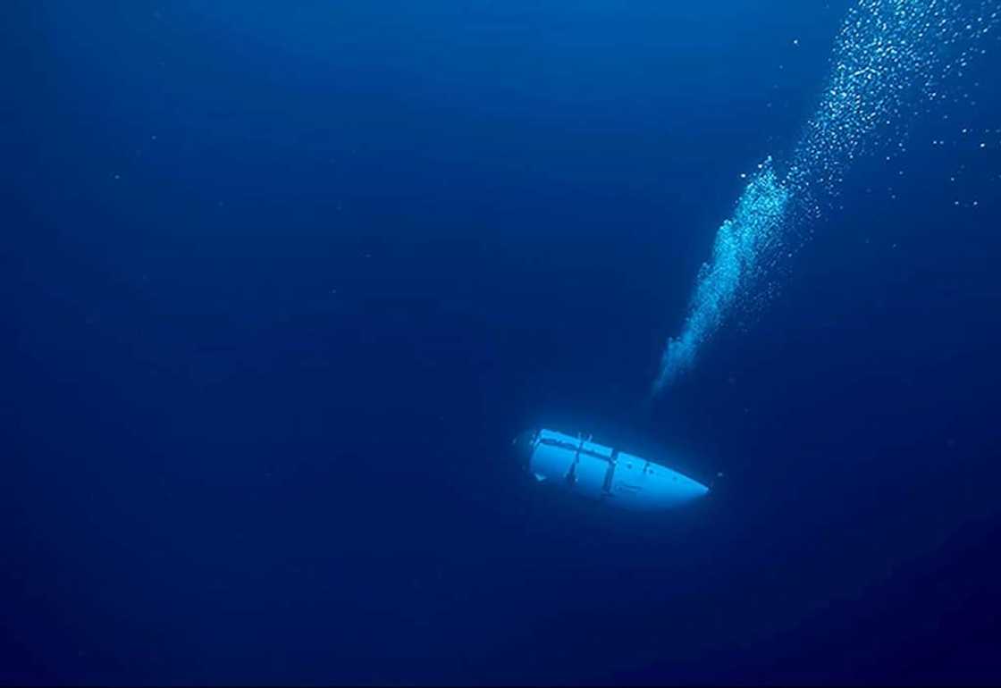 OceanGate, which operated the Titan sub (pictured here during an undated descent) before it imploded last month, said it is suspending all expeditions OceanGate, which operated the Titan sub (pictured here during an undated descent) before it imploded last month, said it is suspending all expeditions