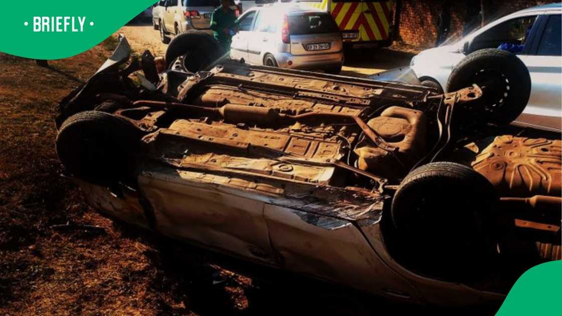 The suspects' vehicle after the shootout The suspects' vehicle after the shootout