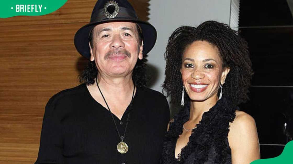 Musicians Carlos Santana and Cindy Blackman at an event Musicians Carlos Santana and Cindy Blackman at an event