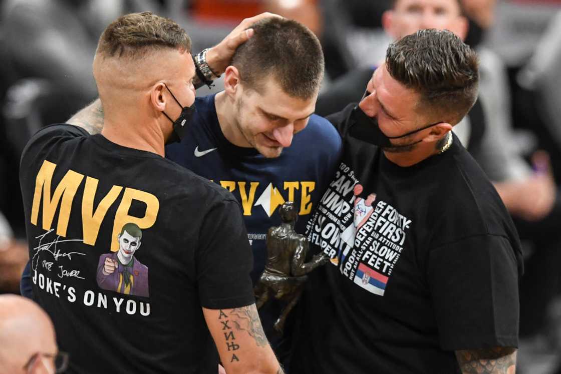 Jokić with his older brothers Jokić with his older brothers