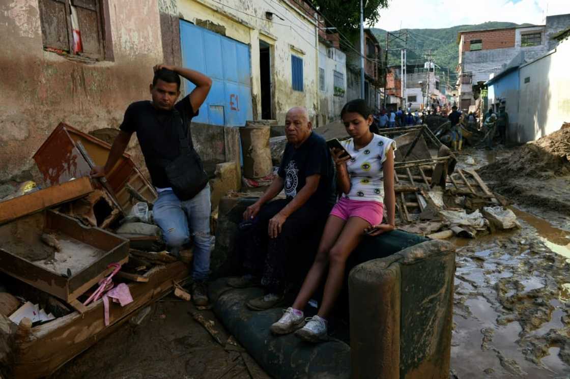 The government said a month's worth of rain fell in the area in just eight hours The government said a month's worth of rain fell in the area in just eight hours