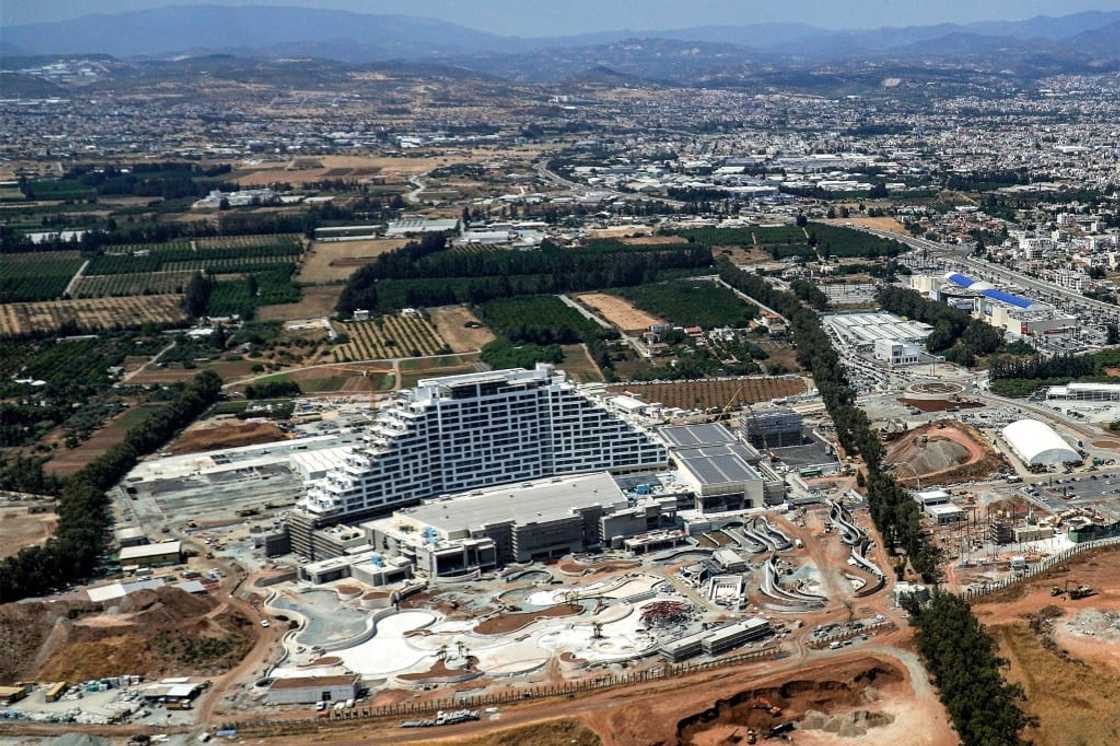 This picture taken on May 24, 2022 shows an aerial view of construction work on the City of Dreams Mediterranean hotel casino in Limassol, Cyprus This picture taken on May 24, 2022 shows an aerial view of construction work on the City of Dreams Mediterranean hotel casino in Limassol, Cyprus