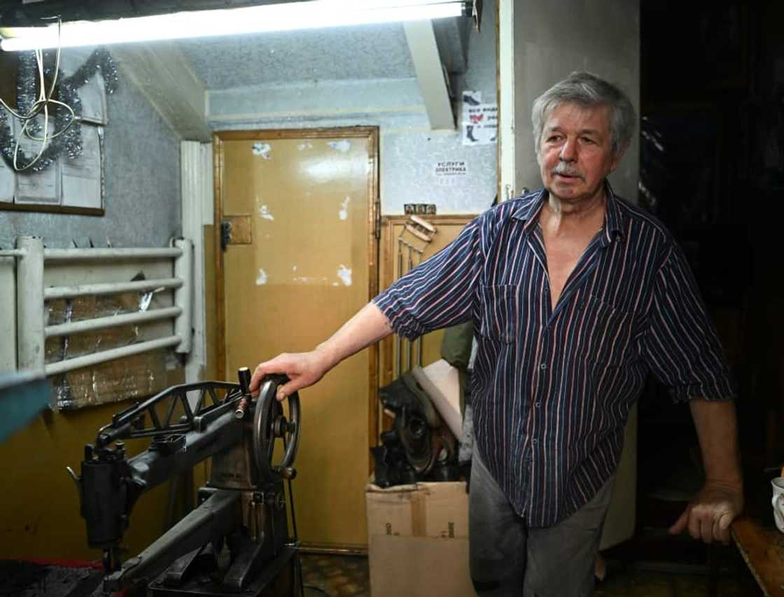 'When soldiers or volunteers drop by to get their shoes repaired, I don't charge them anything,' he says 'When soldiers or volunteers drop by to get their shoes repaired, I don't charge them anything,' he says