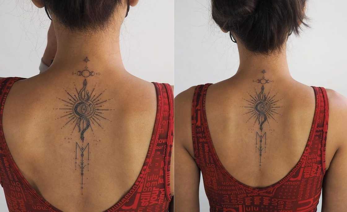 Snake and sun tattoo