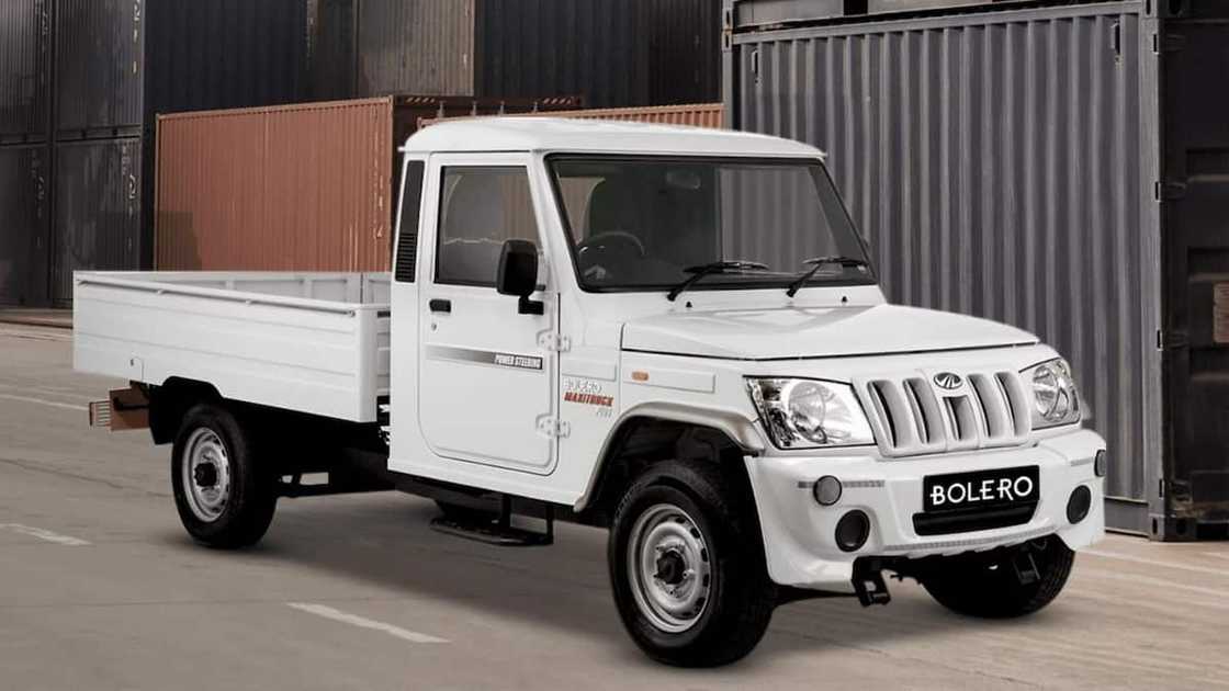 A white Mahindra Bolero 2.5Di