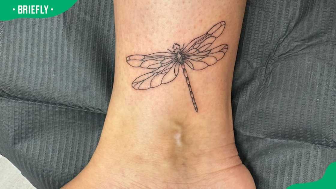 Tiny dragonfly ankle tattoo Tiny dragonfly ankle tattoo