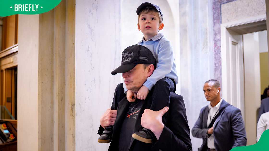 Elon Musk with his son X Æ