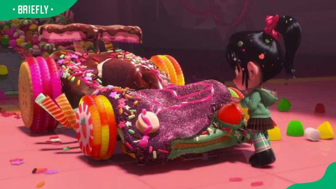 Vanellope von Schweetz next to her candy kart