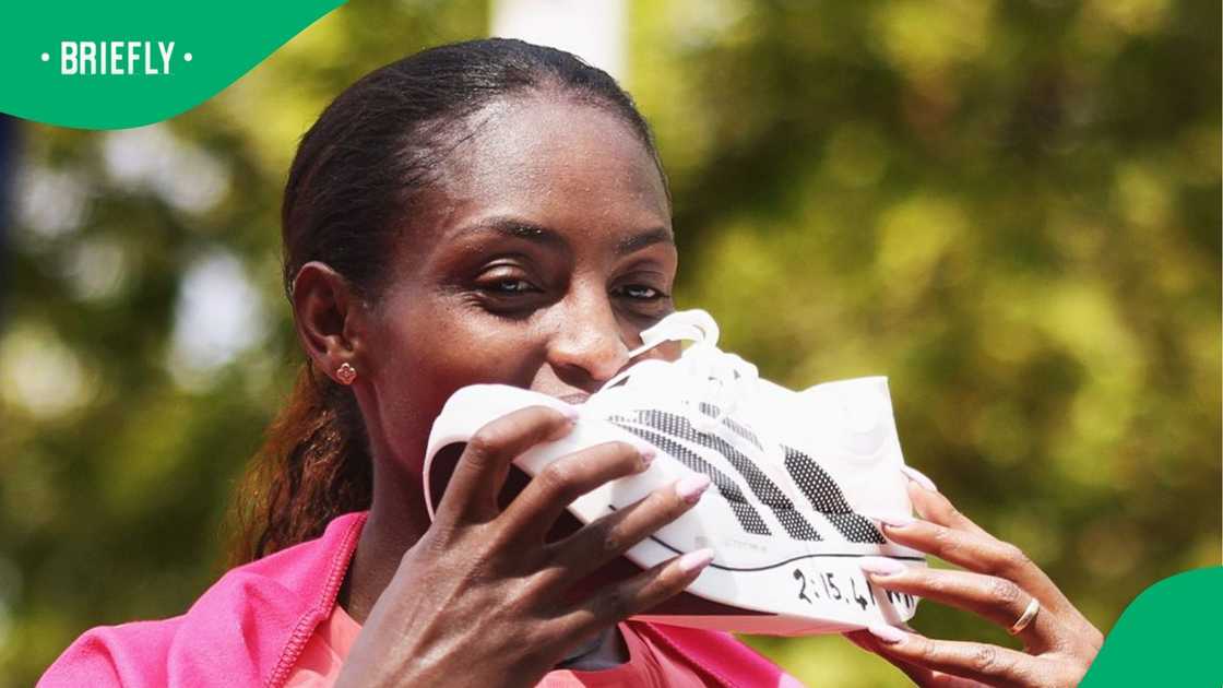 Tigst Assefa shows off adidas shoe after winning London Marathon Tigst Assefa shows off adidas shoe after winning London Marathon