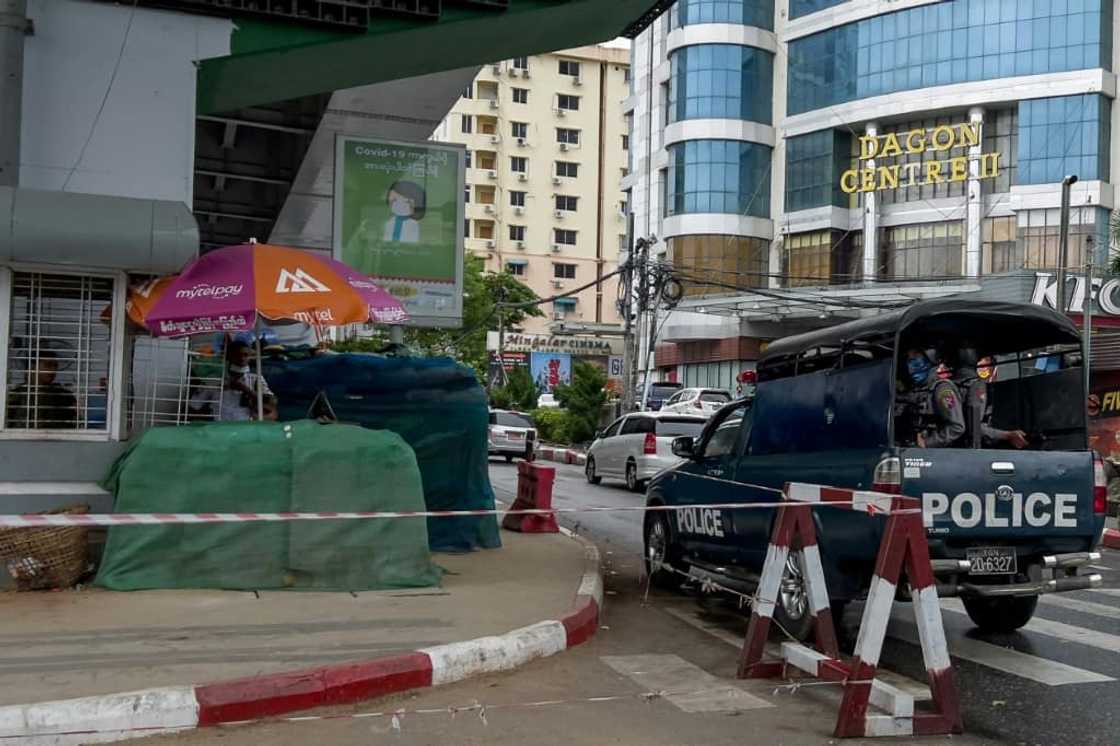 Security forces at a checkpoint in Yangon. Myanmar has been plunged into turmoil since a February 2021 coup which ousted Aung San Suu Kyi's government