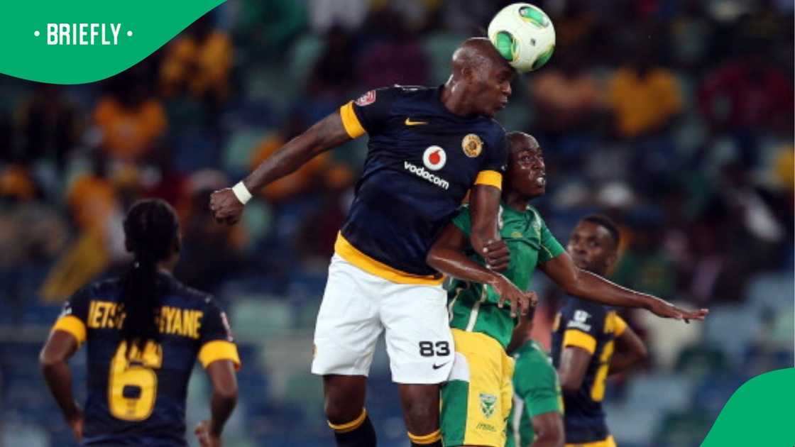 Morgan Gould out jumps Ntlantla Zothwane during the Absa Premiership match between Golden Arrows and Kaizer Chiefs at Moses Mabhida Stadium on December 19, 2013 in Durban, South Africa.